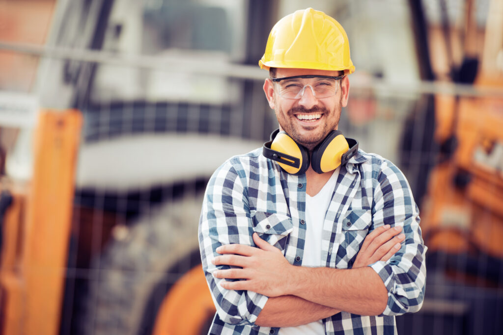 Young construction worker in hard hat